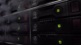 HDD Server Rack. Big dark data center. Green blink. - Powered by Shutterstock - Get 15% off with code: PIKWIZARD15