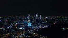 Series of aerial video of Kuala Lumpur city center with New Year's fire works.
