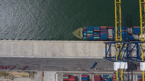 Hyperlapse Aerial view of international port with Crane loading containers in import export business logistics. footage video 4k. industry logistics seaport.