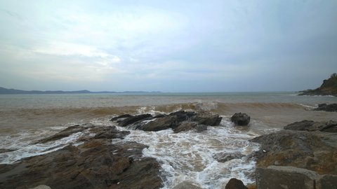4k video of sea wave with stone at Khao Laem Ya in Mu Ko Samet National Park, Rayong Province, Thailand