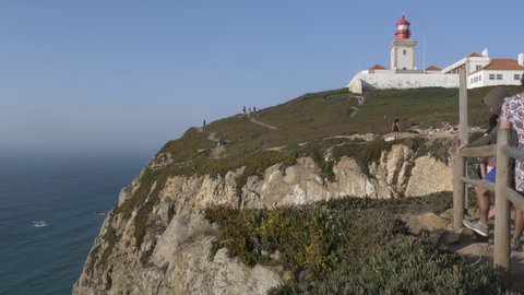 Beautiful View of Cabo da Roca With Tourists. Cabo da Roca is a cape which forms the westernmost point of the Sintra Mountain Range, of mainland Portugal