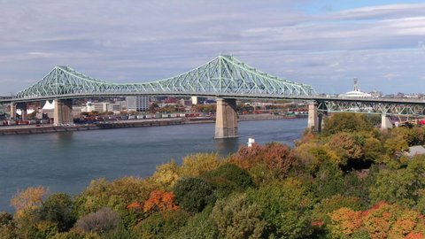 Montreal, Quebec, Canada, aerial view of Jacques Cartier Bridge over the St Lawrence River during fall season. 