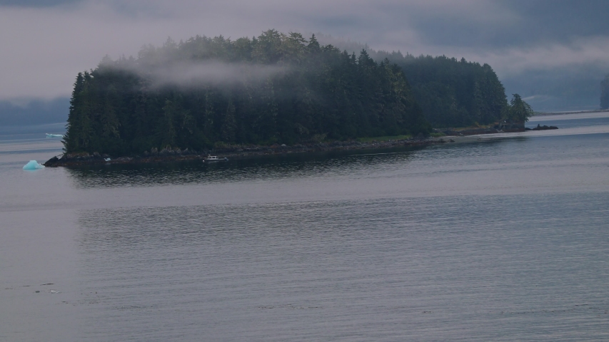 Panning shot of a small island in Endicott Arm, Alaska. Near Juneau.