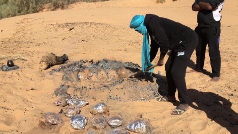 Beni Abbes, Bechar, Algeria - November 02, 2017: Cooking chicken meat in traditional way in Algerian Sahara.