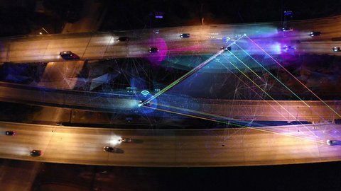 Self driving cars driving on a highway. Top view of Autopilot car on free way with technology tracking. Future transportation, Technology concept of traffic surveillance system in highway in 4K