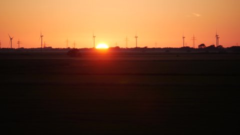 Windmills in northern germany at sunset