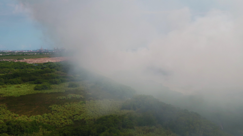Aerial Jamaica Kingston Fire March 2019 Sunny Day 30mm 4K Inspire 2

Aerial video of a fire burning at a landfill in Kingston Jamaica on a sunny day.