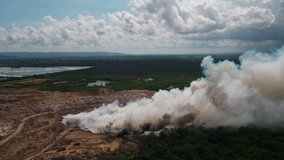 Aerial Jamaica Kingston Fire March 2019 Sunny Day 30mm 4K Inspire 2

Aerial video of a fire burning at a landfill in Kingston Jamaica on a sunny day.
