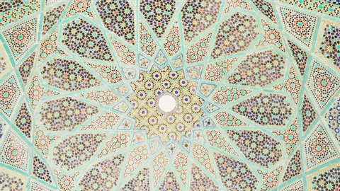 Shiraz / Iran - 02 10 2019: Inside up shot in the Tomb of hafez, showing the stunning architecture.