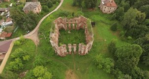4K aerial summer morning drone video of abandoned dilapidated Petrovskoye Alabino mansion built for Demidov family in 1700s in times of Katherine The Great located 50 km south of Moscow, Russia