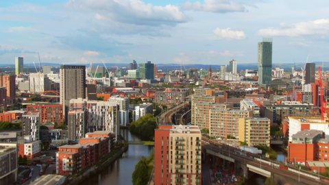 manchester aerial view rising forward over city centre reveal shot england