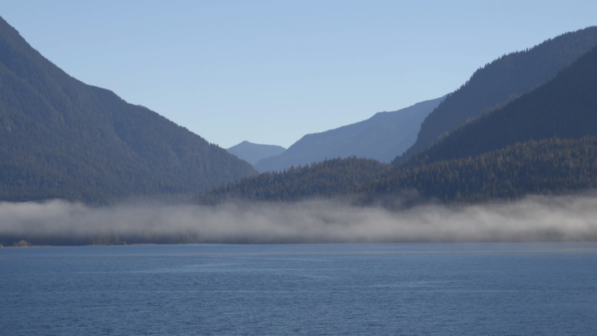 Alaska Nature Landscape - Inside passage seen from cruise ship. Seen from tourist on adventure travel tour in Alaska , Wilderness area in the Tongass National Forest.