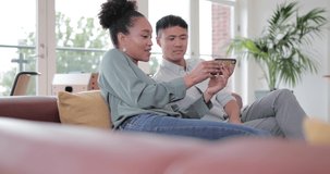 Couple looking at a video on a smartphone