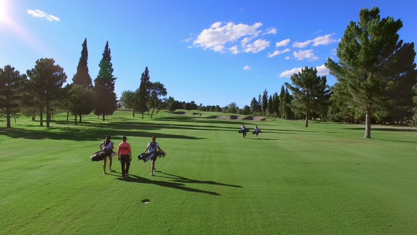 Golf Course Aerial with players on the course Royalty-Free Stock Footage #1036003277
