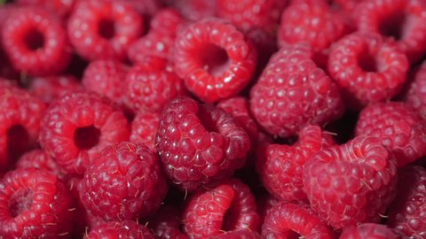 Close Up Rotation Loopable Raspberry. Fresh, Juicy Raspberry Background, Ripe. Macro Red Raspberries Fruit. Fresh Raspberry Fruits As Food Dackground. Healthy Food Organic Nutrition.