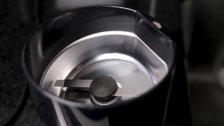 Coffee Beans Get Placed in a Grinder | Shutterstock HD Video #1036017923