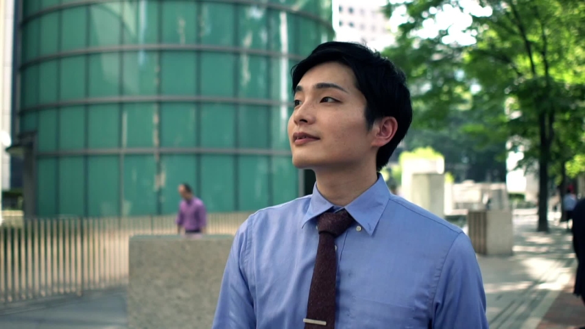 Japanese businessman walking in Shinjuku building