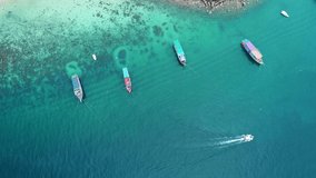 Aerial view Top view aerial video of beauty nature landscape with sand beach, corals and sea on Koh Lan island of thailand are a popular holiday destination for tourists visiting, 4k 