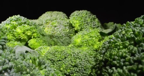 Details of a Broccoli Floret with Woter Drops. Extremely macro shot. 4K.