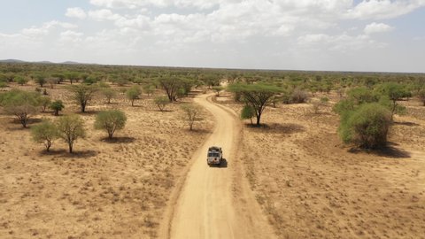 Aerial view of four wheel drive jeep in the deserts of South Ethiopia
