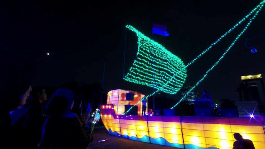 Jakarta, Indonesia - 15 August 2019: Variety of the beauty of the Festival of light in the National Monument square. | Shutterstock HD Video #1036069391
