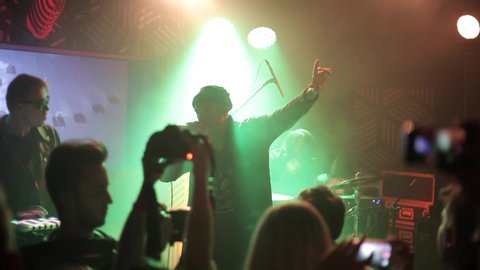 MOSCOW-30 NOVEMBER,2015: Legendary Russian rap singer Ligalize MC performing with modern electronic music producer Oligarkh at Jagermeister Awards ceremony in night club