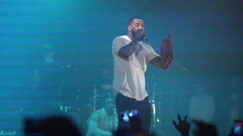 MOSCOW-18 DECEMBER,2016:Famous American rap singer The Game (Jayceon Terrell Taylor) performing live on stage in night club.Gangsta rapper from Compton singing in Russia