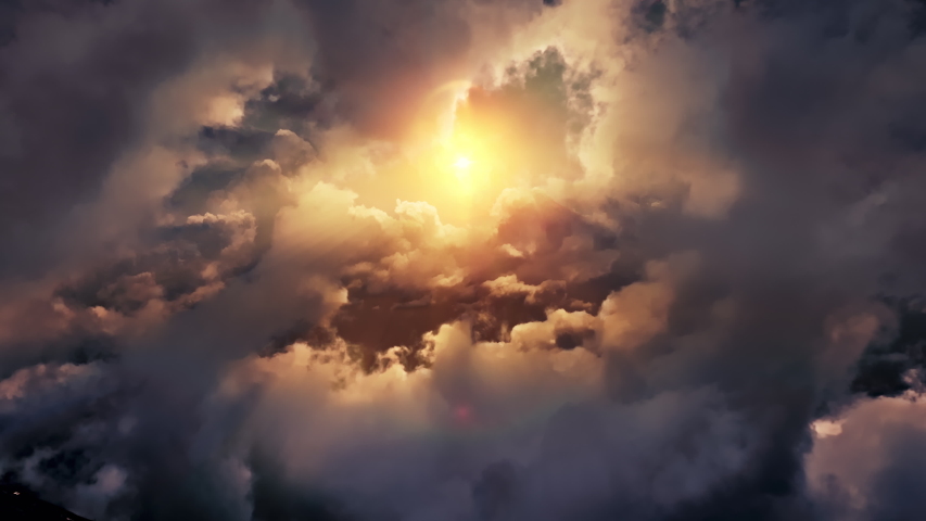 Flying through heavenly beautiful sunny cloudscape. Amazing timelapse of golden fluffy clouds moving softly on the sky and the sun shining through the clouds with beautiful rays and lens flare. | Shutterstock HD Video #1036084157