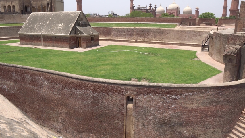 View of Badshahi Mosque and Alamgiri Gate from the Lahore Fort on a Sunny Blue Sky Day