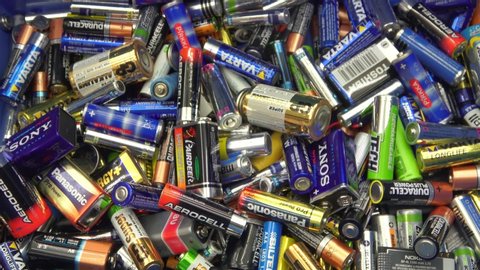 Battery waste top view footage. Pile of old batteries going to recycling station. 29 August 2019. Finland, espoo