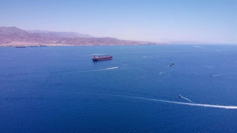 Large Tanker Ship in The red sea With small boats Aerial
Drone footage over the red sea With Large Tanker Ship and speed boats
