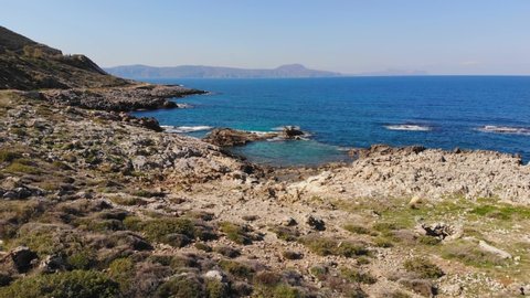 Drone footage above the rocky coastline of Crete between Rethymno and Petres