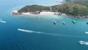 Aerial view Top view aerial video of beauty nature landscape with sand beach, corals and sea on Koh Lan island of thailand are a popular holiday destination for tourists visiting, 4k 