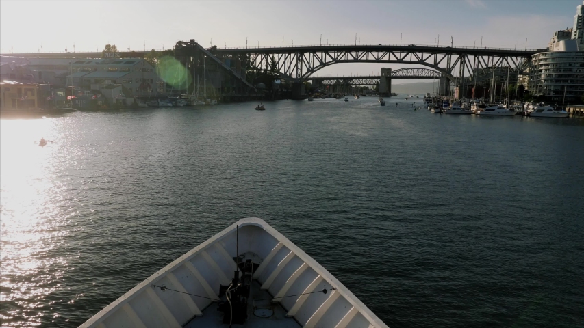 Vancouver Granville Island Bridge, downtown, on a yacht/boat.