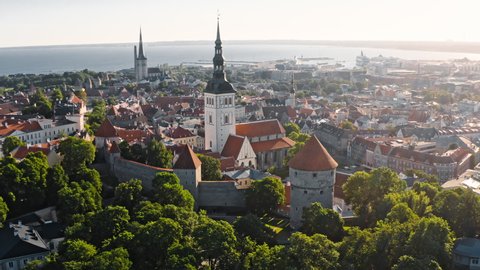Tallinn, Estonia: morning drone close-up flight near tower of St. Nicholas' Church in old town