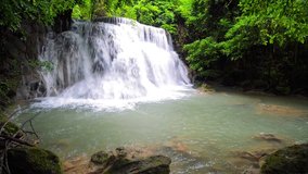 Beautiful nature footage of Huay Mae Kamin Waterfall in tropical rainforest at Kanchanaburi province, Thailand