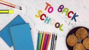 Back to school stop motion animation - Back to school appear and disappear from table