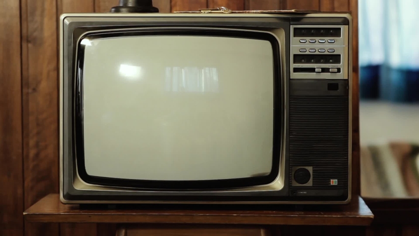 Vintage Television Set Green Background with Noise and Static. Zoom Out. You can replace green screen with the footage or picture you want with “Keying” effect in AE (check tutorials in YouTube). | Shutterstock HD Video #1036174745