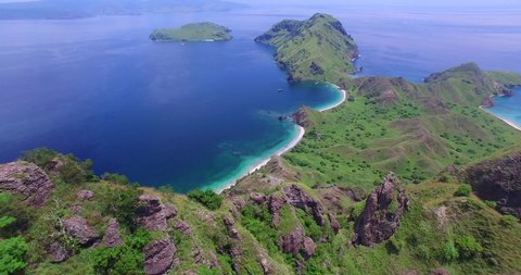 Aerials Flores Komodo National Park includes Island of Padur, Rinca and Pink Beach and Island Villages, Tourist boats and Mountain/Beach Views