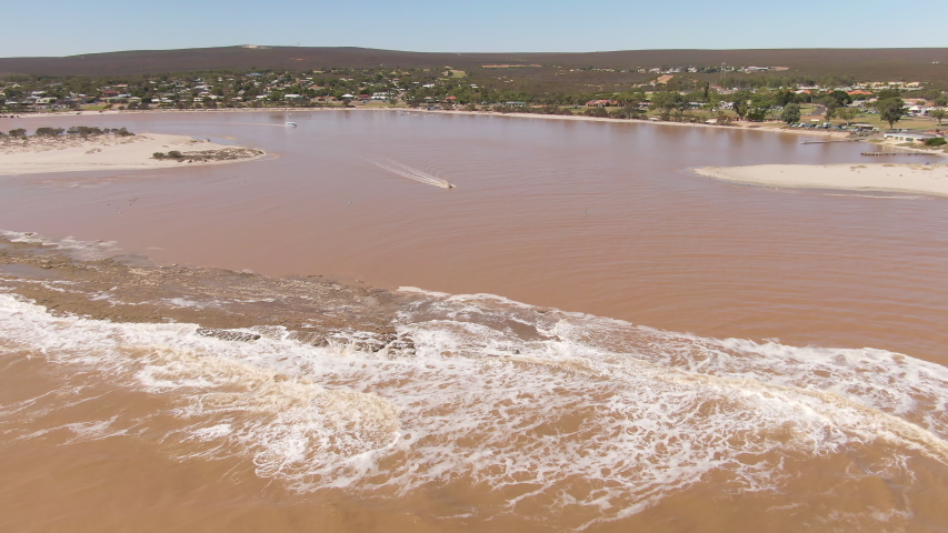 Aerial footage of Kalbarri resort town where Kunbun Brook enters the ocean. Gantheaume Bay. Western Australia