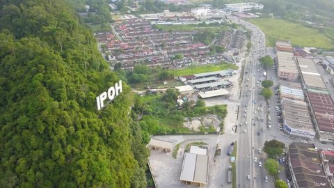 IPOH,MALAYSIA. AUGUST 20, 2019 : Aerial view of IPOH signage attach at mountain near highway Ipoh, Ipoh is a capital state of Perak Malaysia