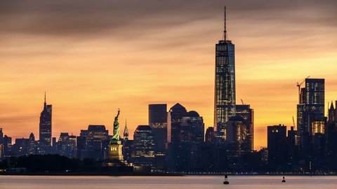 Timelapse with Lower Manhattan, Freedom Tower and The Statue of Liberty at sunrise. For the 4K version check Clip ID 10617296.