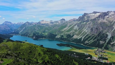 Amazing view over Lake Sils and the Engadin region in Switzerland - aerial timelapse shot