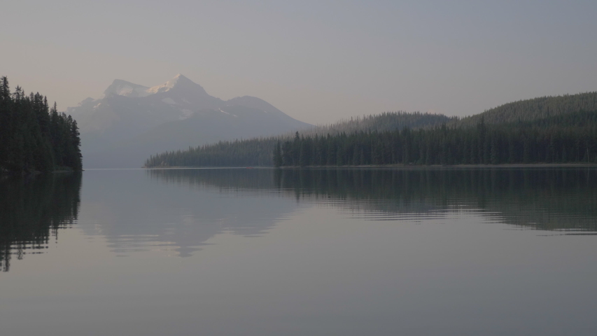 Peaceful lake scene at sunset in Banff Canada