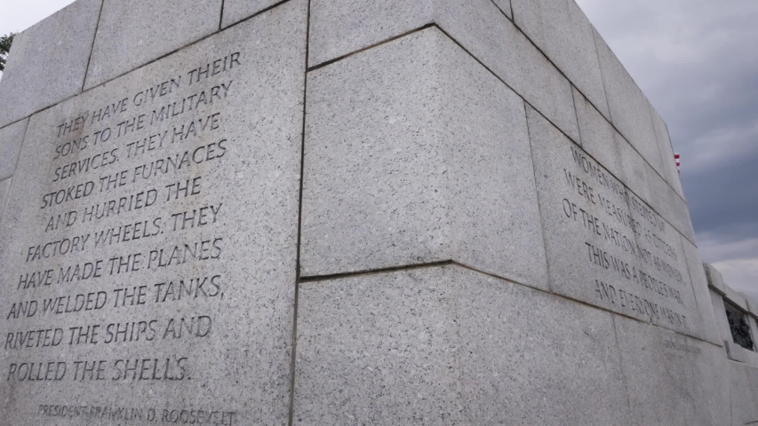 Writing on a wall at the World War II memorial in the National Mall in Washington D.C.