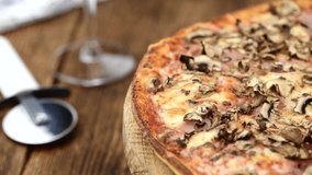 Mushroom Pizza rotating on a plate (4K; seamless loopable)