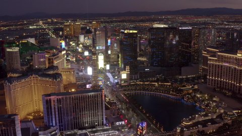 Las Vegas, Nevada/USA - August 26, 2019: Dusk takes hold of the Las Vegas Strip and the surrounding valley in this aerial shot of Sin City. 