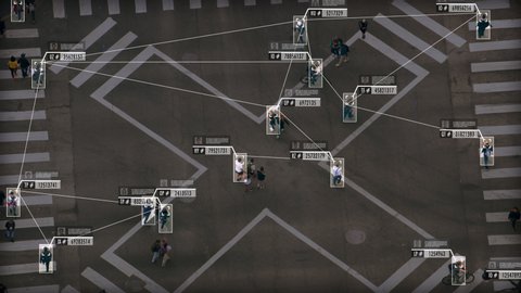 High view of people crossing a major avenue. Facial recognition interface showing personal data for each person. Surveillance concept. Artificial intelligence. Deep learning. Crosswalk. Red Weapon 8K.