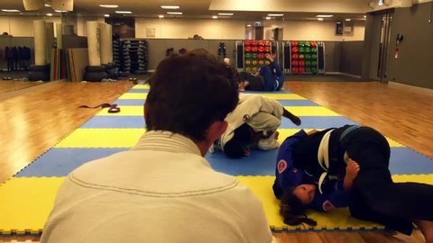 Lisbon, Portugal - August 24, 2019: People practice Brazilian Jiu-Jitsu sparring, a grappling type martial arts with a kimono gi - NOT STAGED CONTENT OR AT CLOSED EVENT