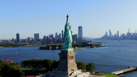 This video shows aerial views of the Statue of Liberty.  The Statue of Liberty is a colossal neoclassical sculpture on Liberty Island in New York Harbor in New York, in the United States.